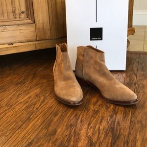 Tucker dark saddle suede bootie. Light wear.